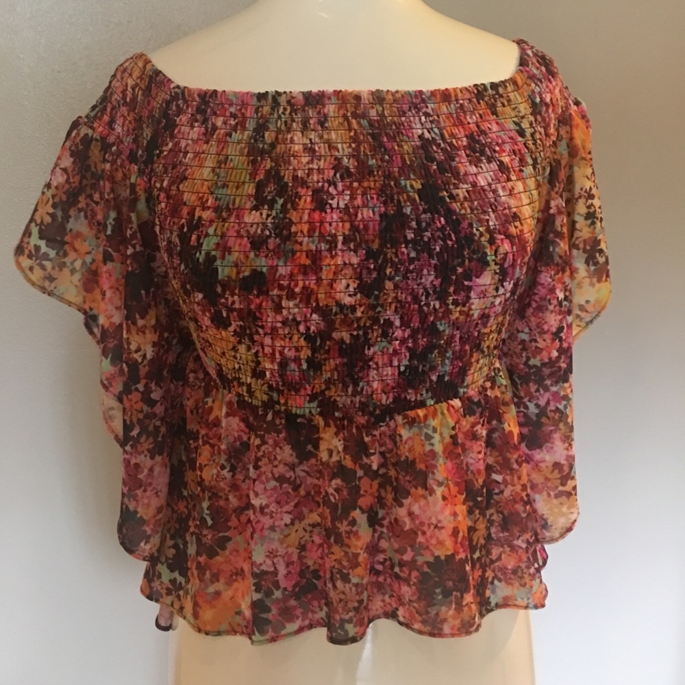 Off the shoulder floral peplum blouse